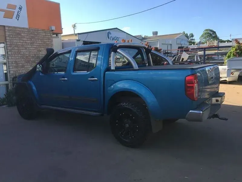 A Blue Truck is Parked in Front of a Building — Emerald 4x4 in Emerald, QLD