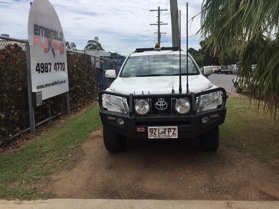 A White Truck is Parked in Front of a Sign That Says Emerald — Emerald 4x4 in Emerald, QLD