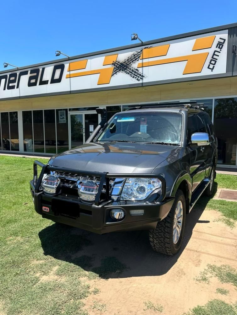 A Black Suv is Parked in Front of a Building — Emerald 4x4 in Emerald, QLD