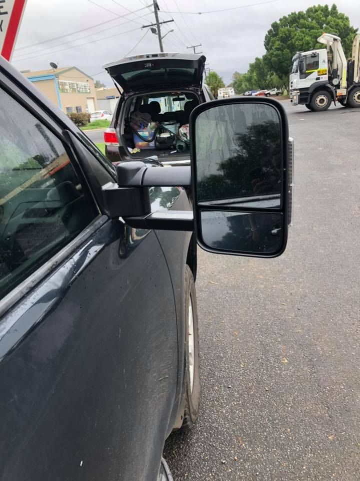A Car is Parked on the Side of the Road With Its Trunk Open — Emerald 4x4 in Emerald, QLD