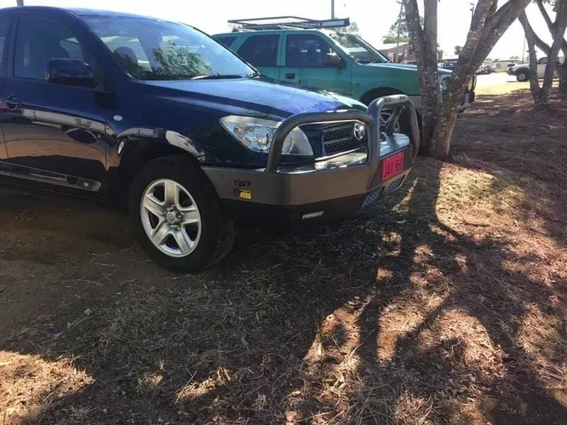 A Blue Suv is Parked Next to a Green Suv — Emerald 4x4 in Emerald, QLD