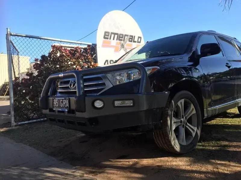 A Black Suv is Parked in Front of a Sign That Says Emerald — Emerald 4x4 in Emerald, QLD