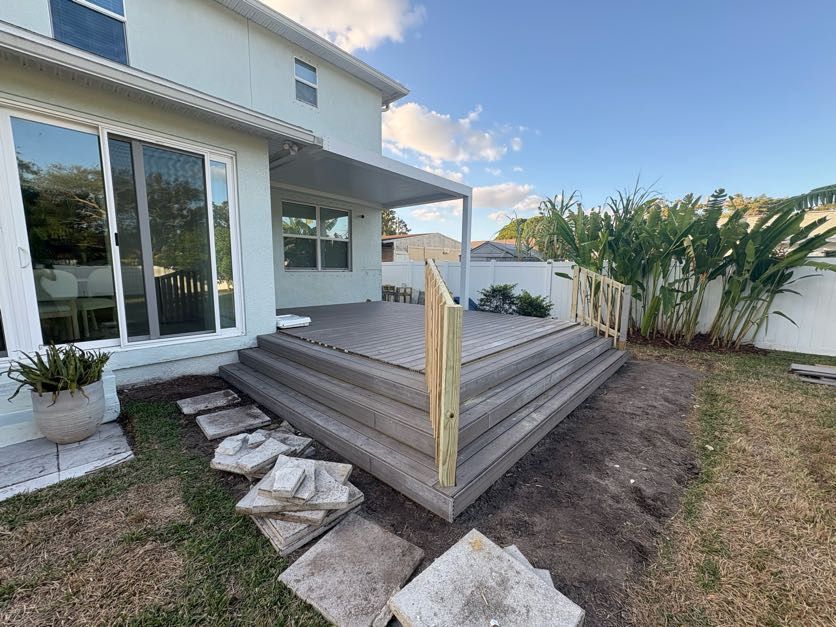 Home Addition Costs in Tampa, FL for a residential home expansion with custom deck construction and outdoor living area.