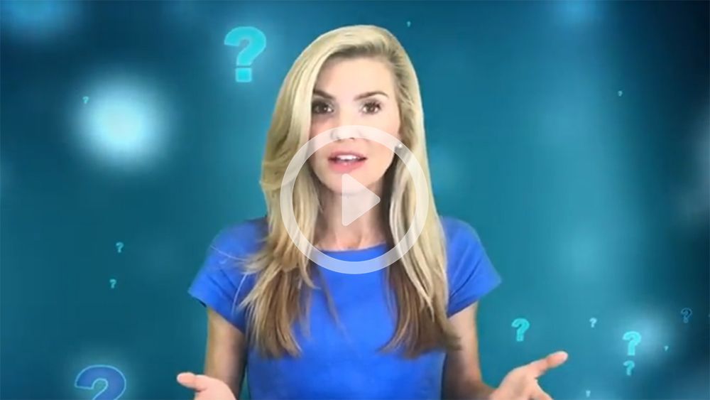 A woman in a blue shirt is standing in front of a blue background with question marks.