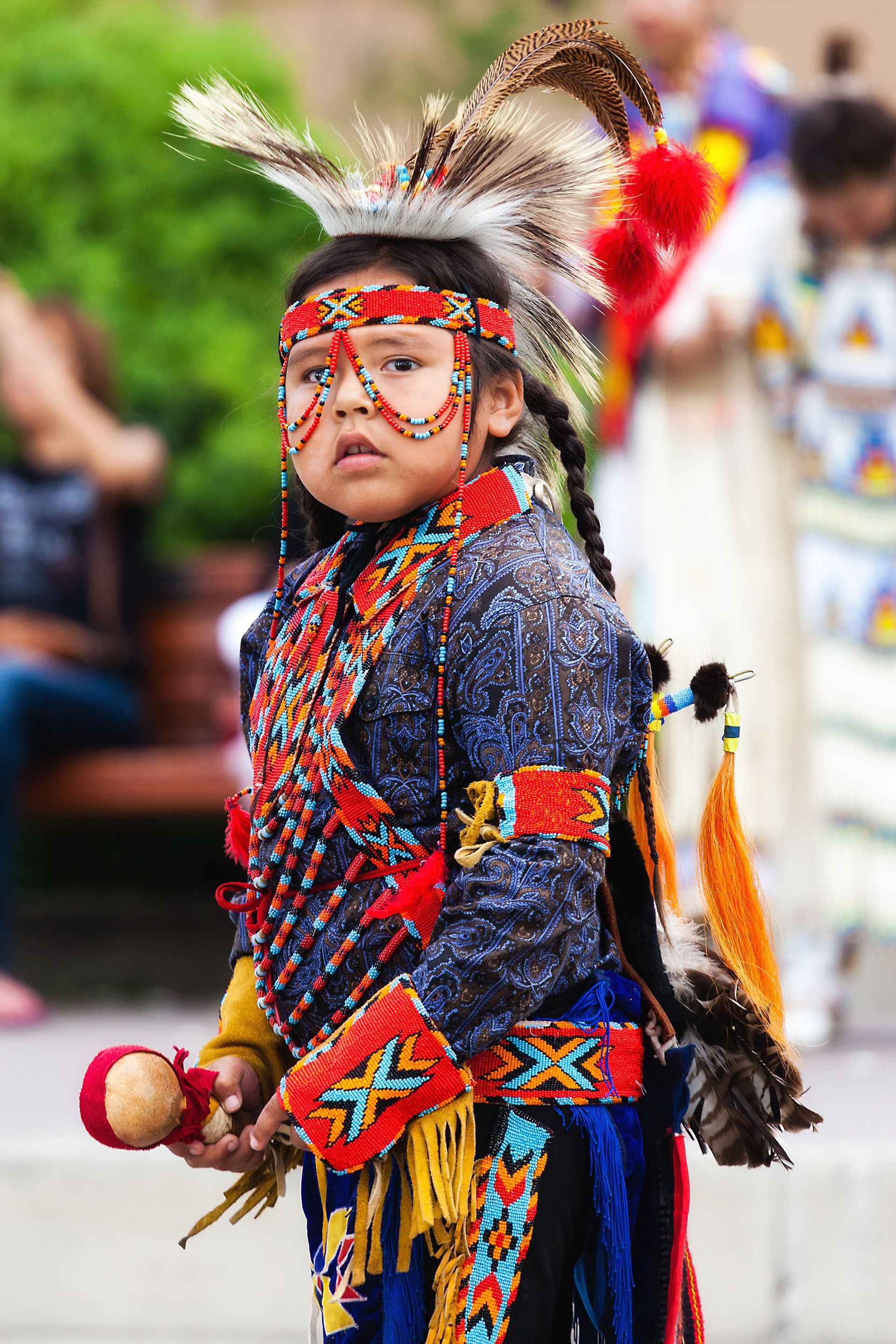 Child dressed in traditional native American clothing