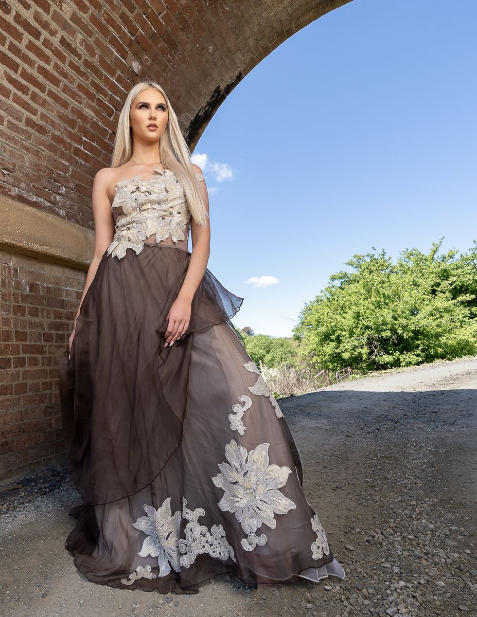 front view white gown with detailed beading, flowers and tulle