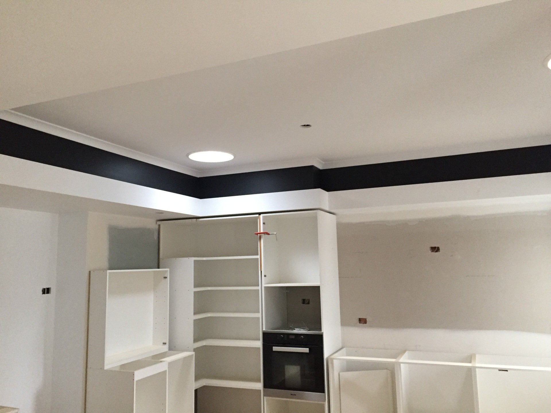 worker doing plaster on the wall
