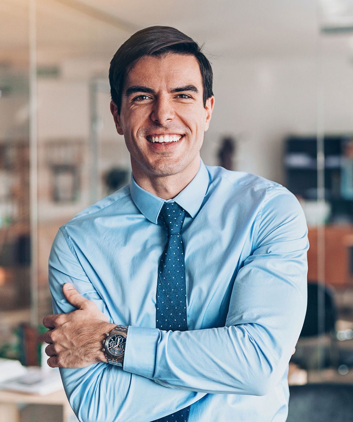 Smiling Young Businessman In The Office – Dallas, TX – Delta Dallas