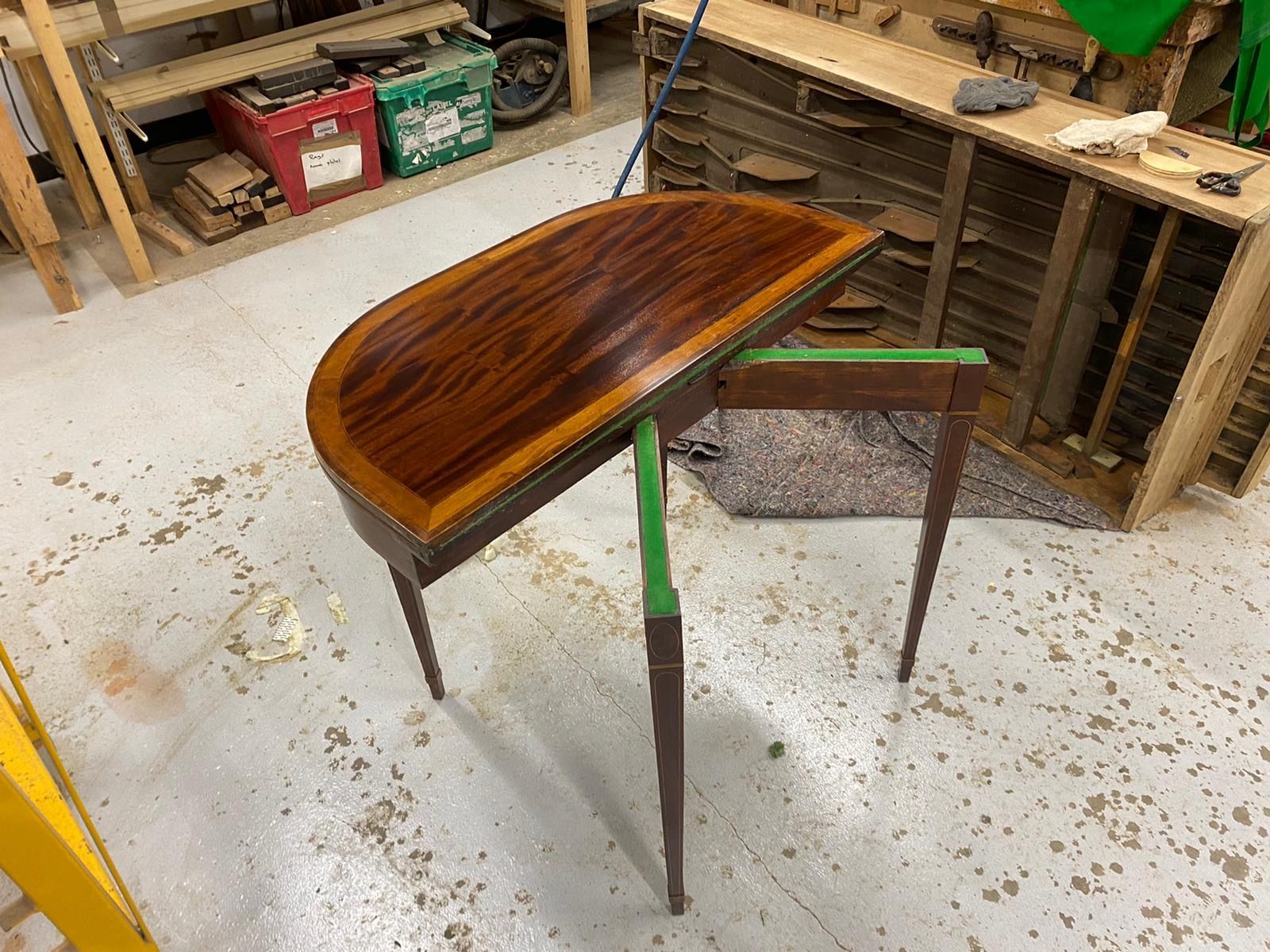 polished folding card table with baize