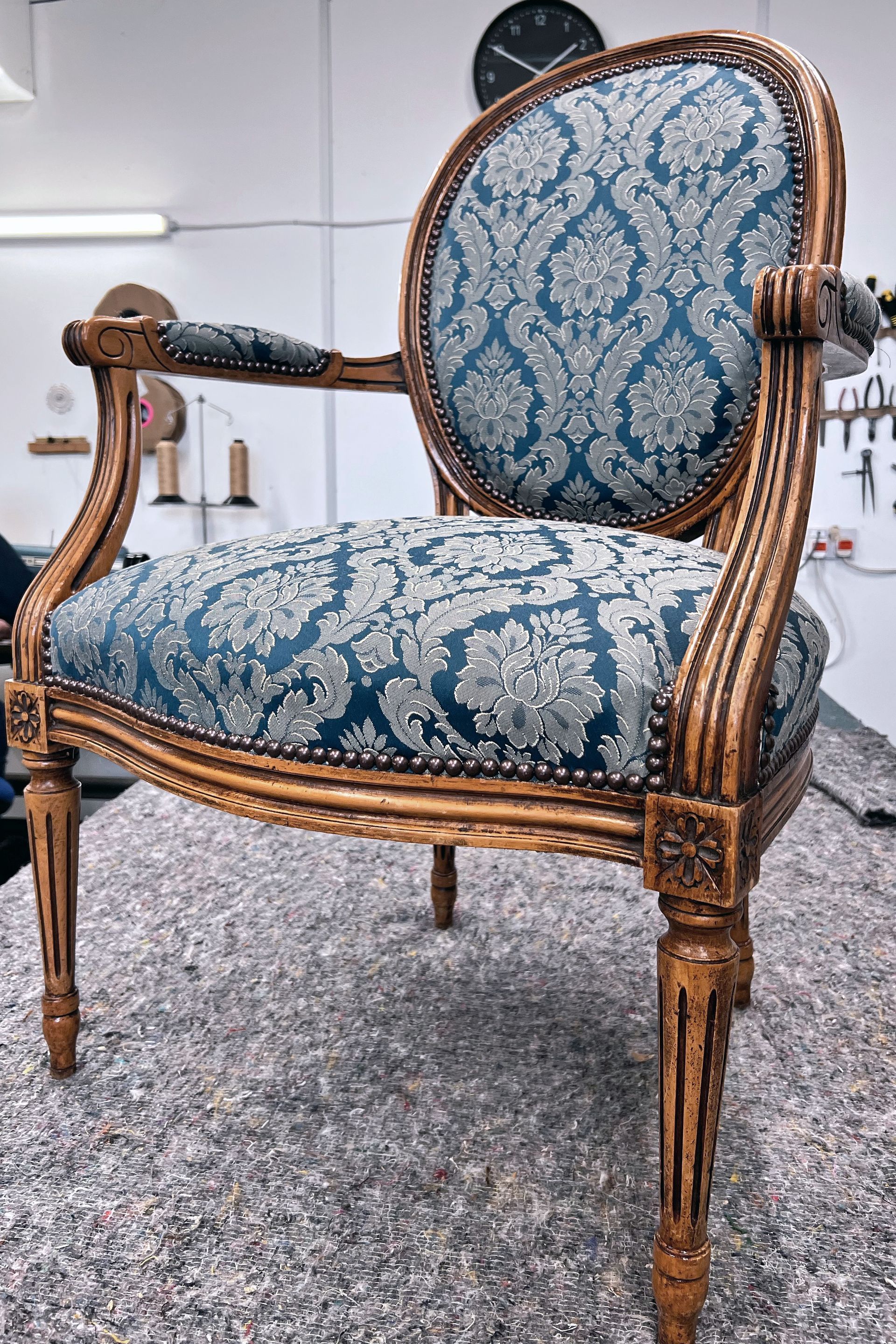 plump upholstered jaquard french armchair
