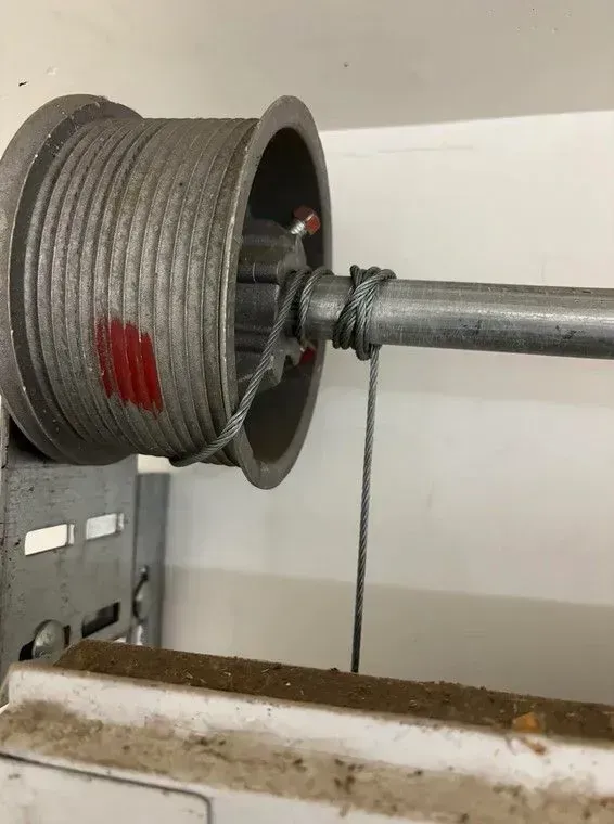 Garage door torsion spring and cable drum repair in Aurora CO