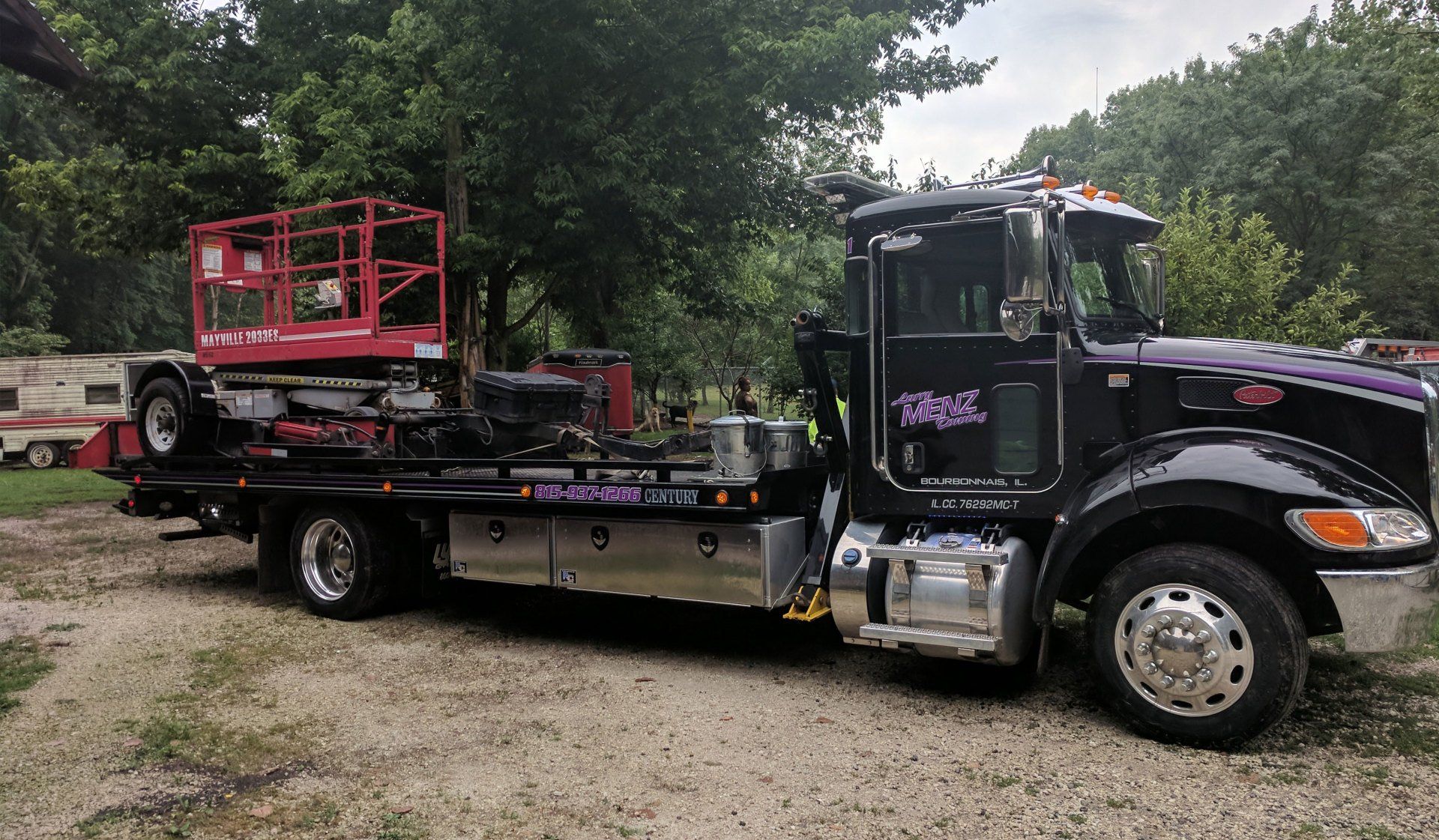 Tow truck towing a broken down car — Flatbed Trailers in Bourbannais, IL