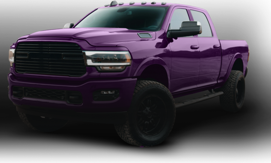 Purple lifted pickup truck with black wheels and a black grill. | Aus Tex Transmission