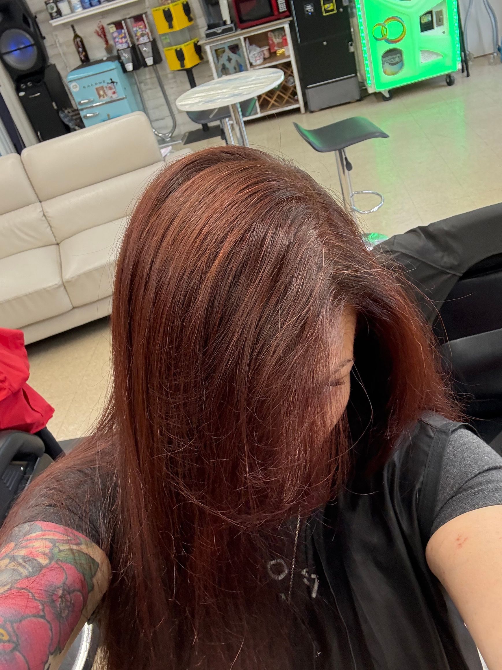 Blond hair, underwater, flowing down against a bright blue background.