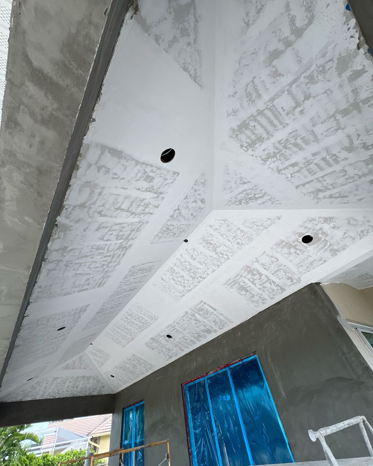 A ceiling of a building that is being built