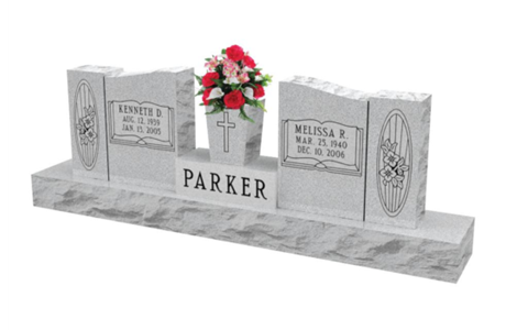 A white gravestone with the name parker on it