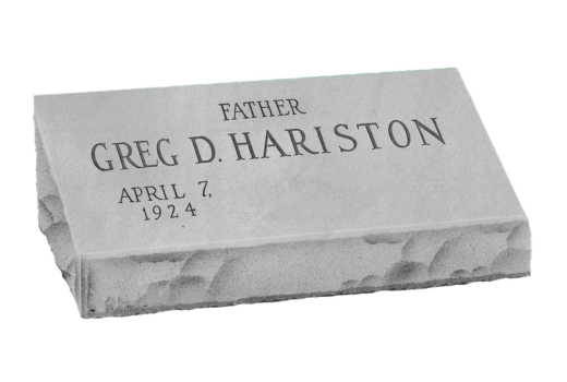 A gravestone with the name greg d. hariston on it