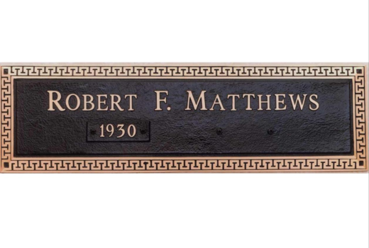 A grave marker for robert f. matthews from 1930