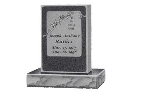 A gravestone for joseph anthony ruther is on a marble base