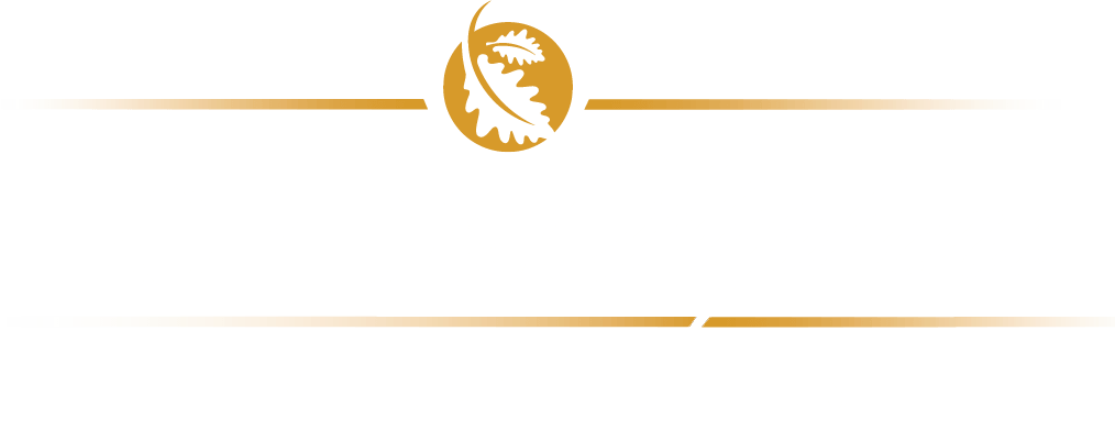 A logo with a leaf in a circle on a white background.