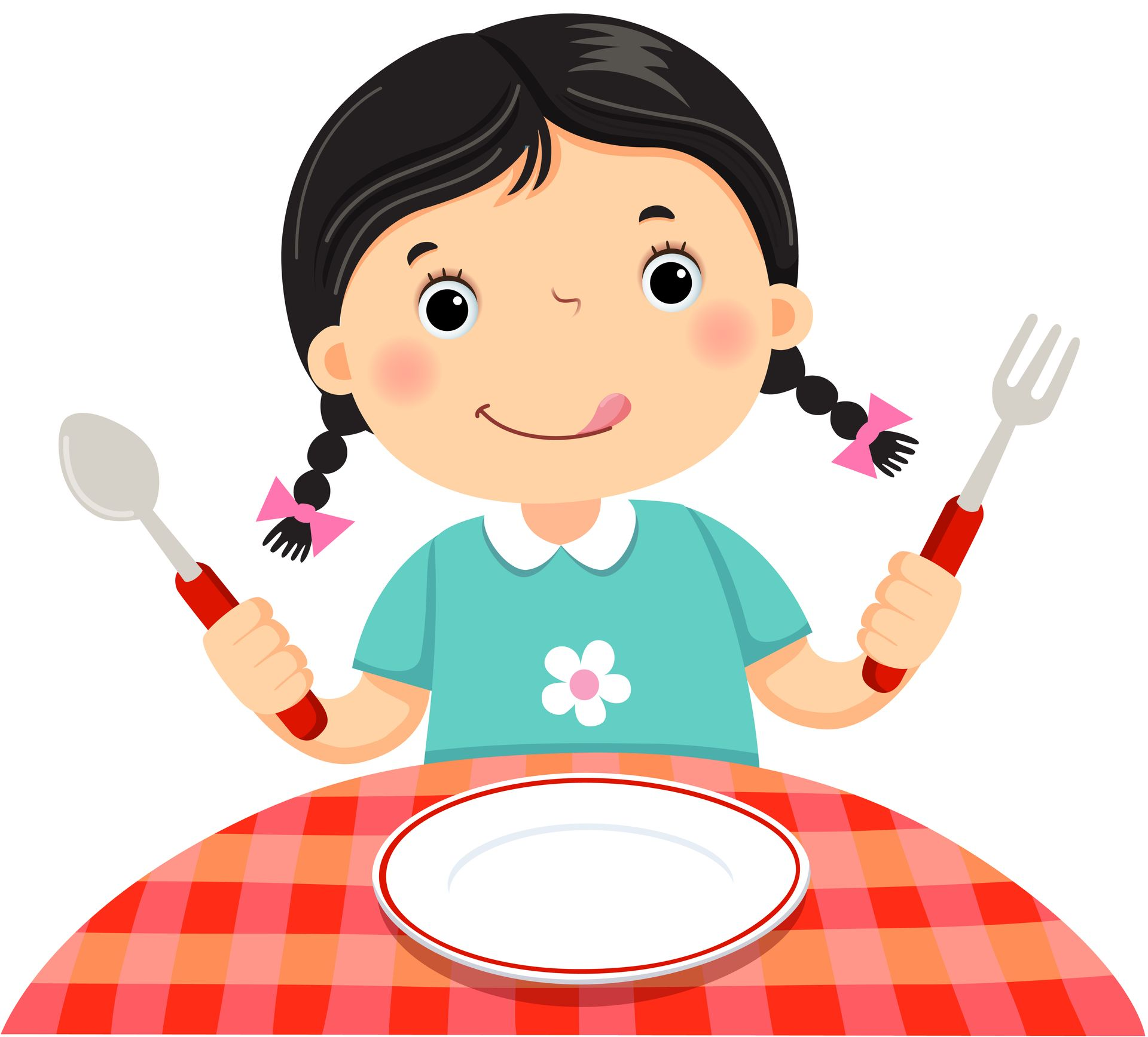 Girl with pigtails licking lips, holding a spoon and fork over an empty plate on a checkered tablecloth.