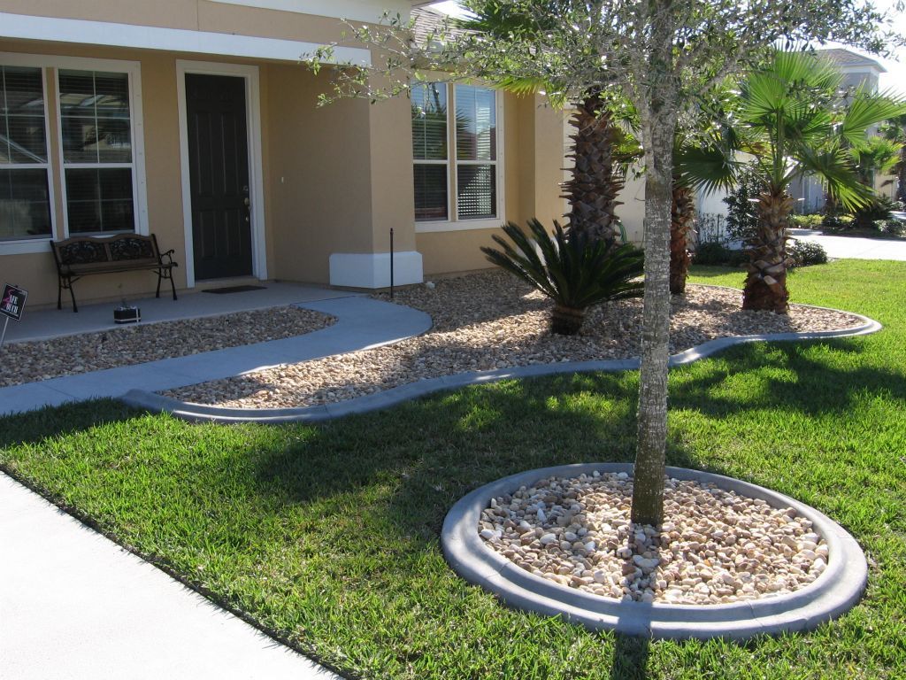A house with a tree in front of it
