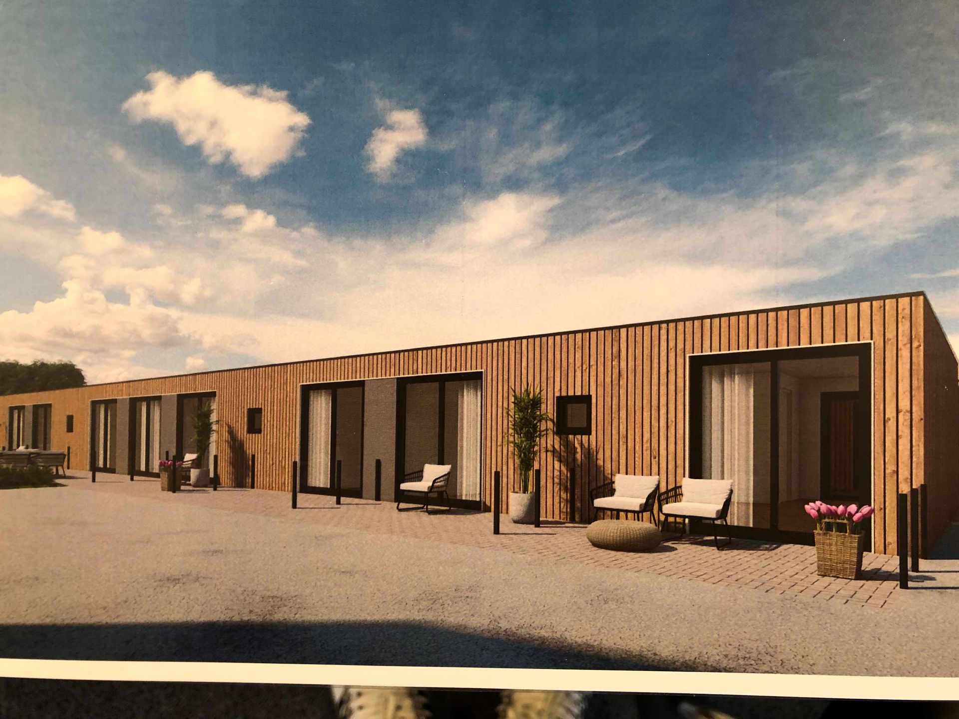 Een impressie van een rij houten huizen