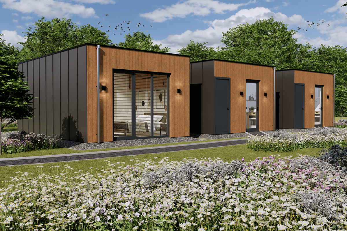 Een paar huizen naast elkaar in een bloemenveld.