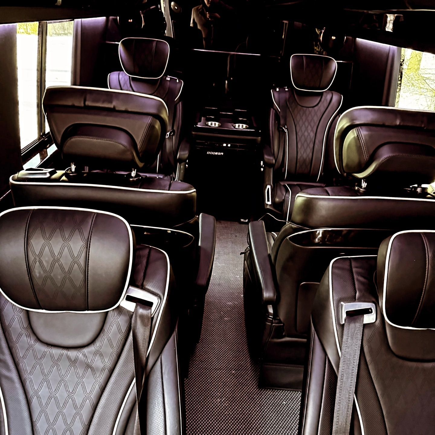 The inside of a van with a lot of seats