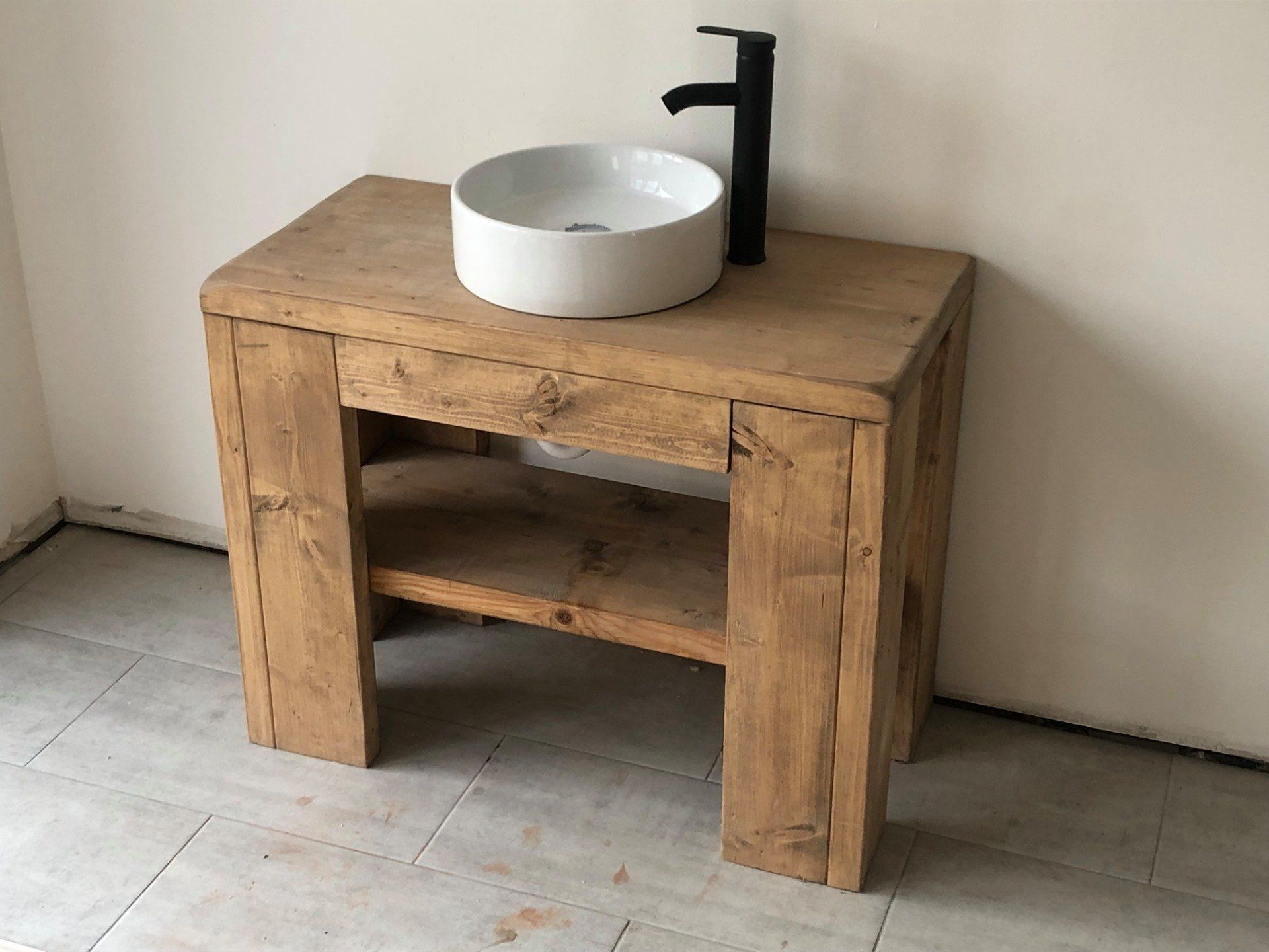 brown table with white basin