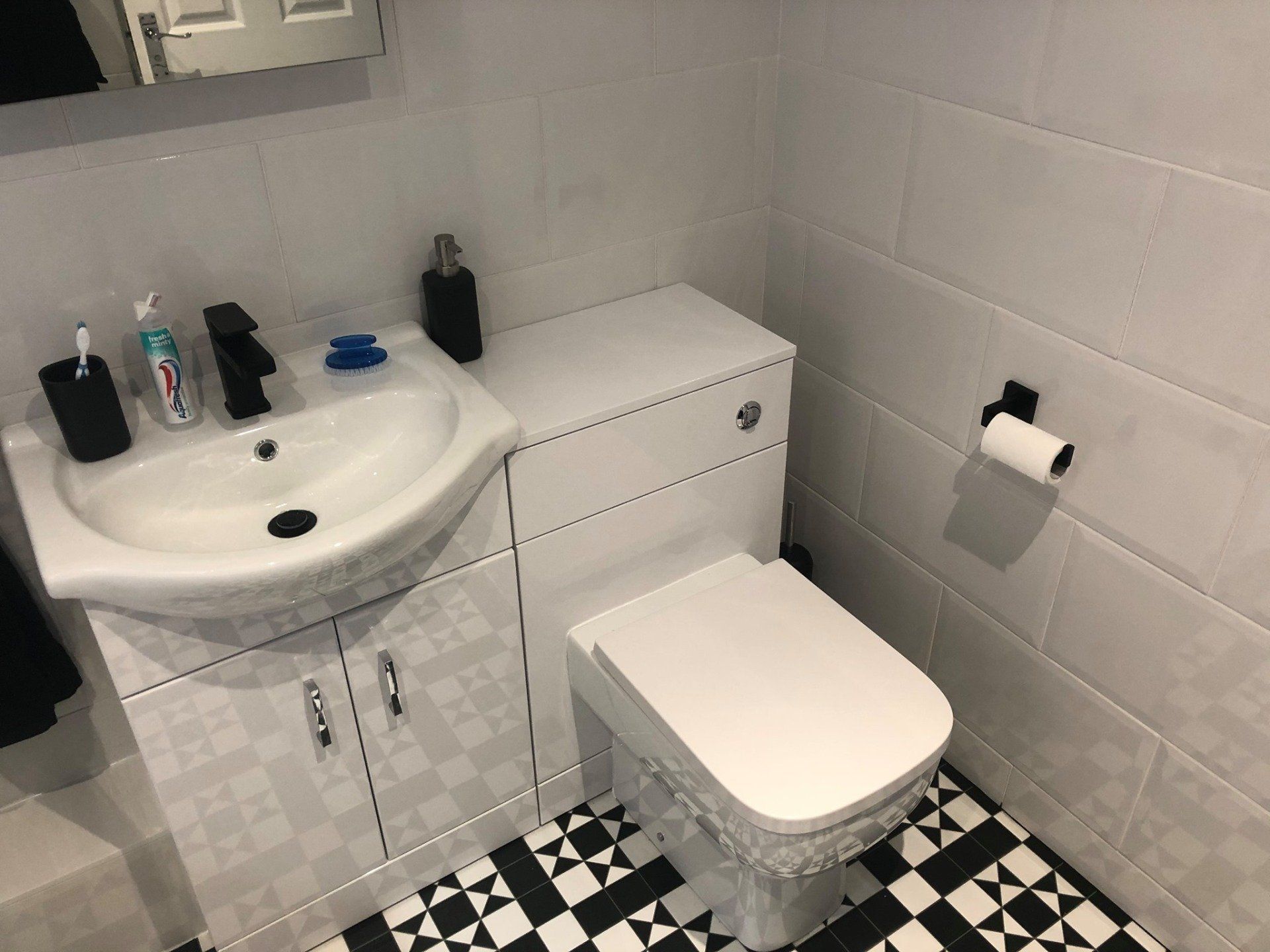 bathroom with tiled floor