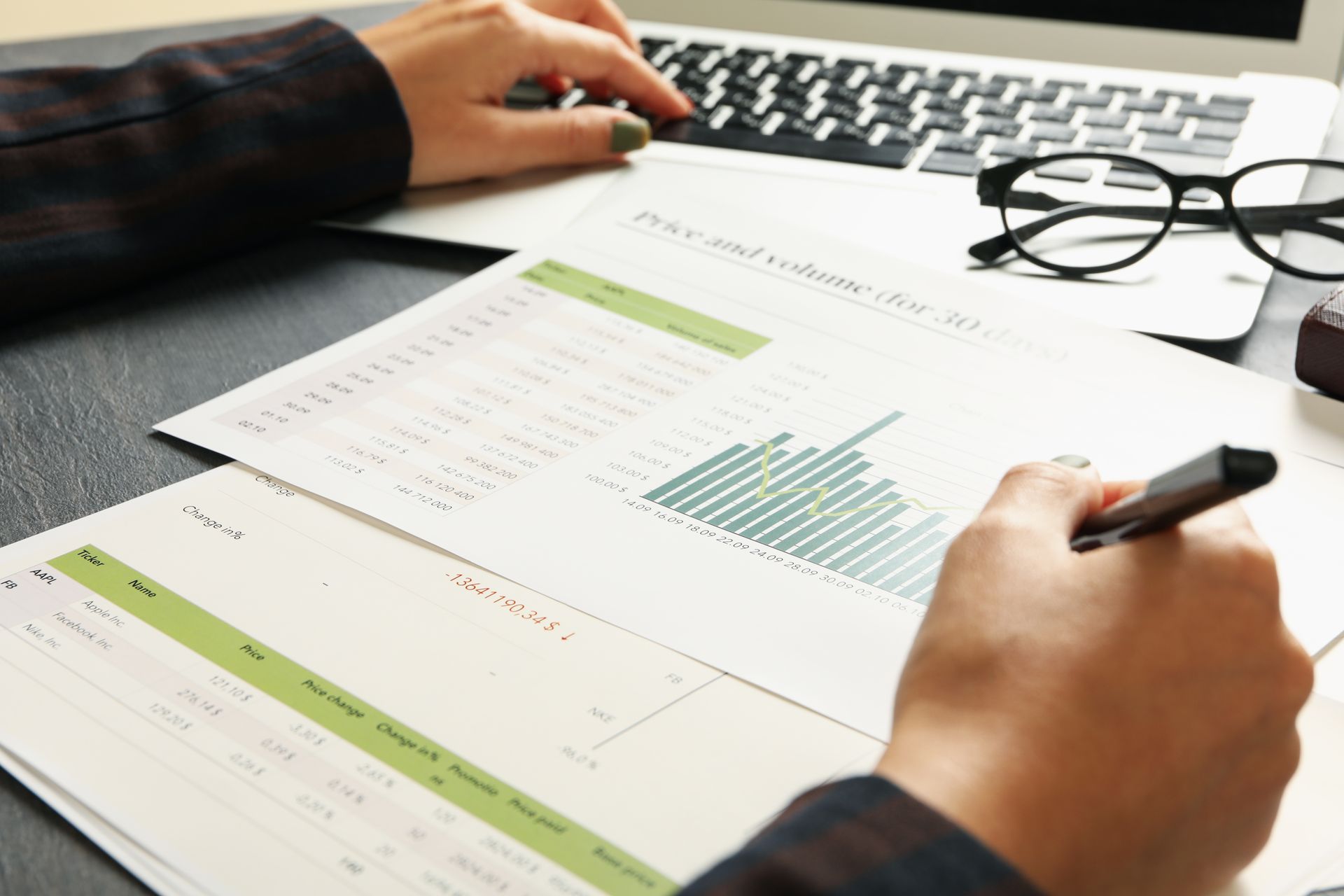A young boy is sitting in the driver 's seat of a convertible car.