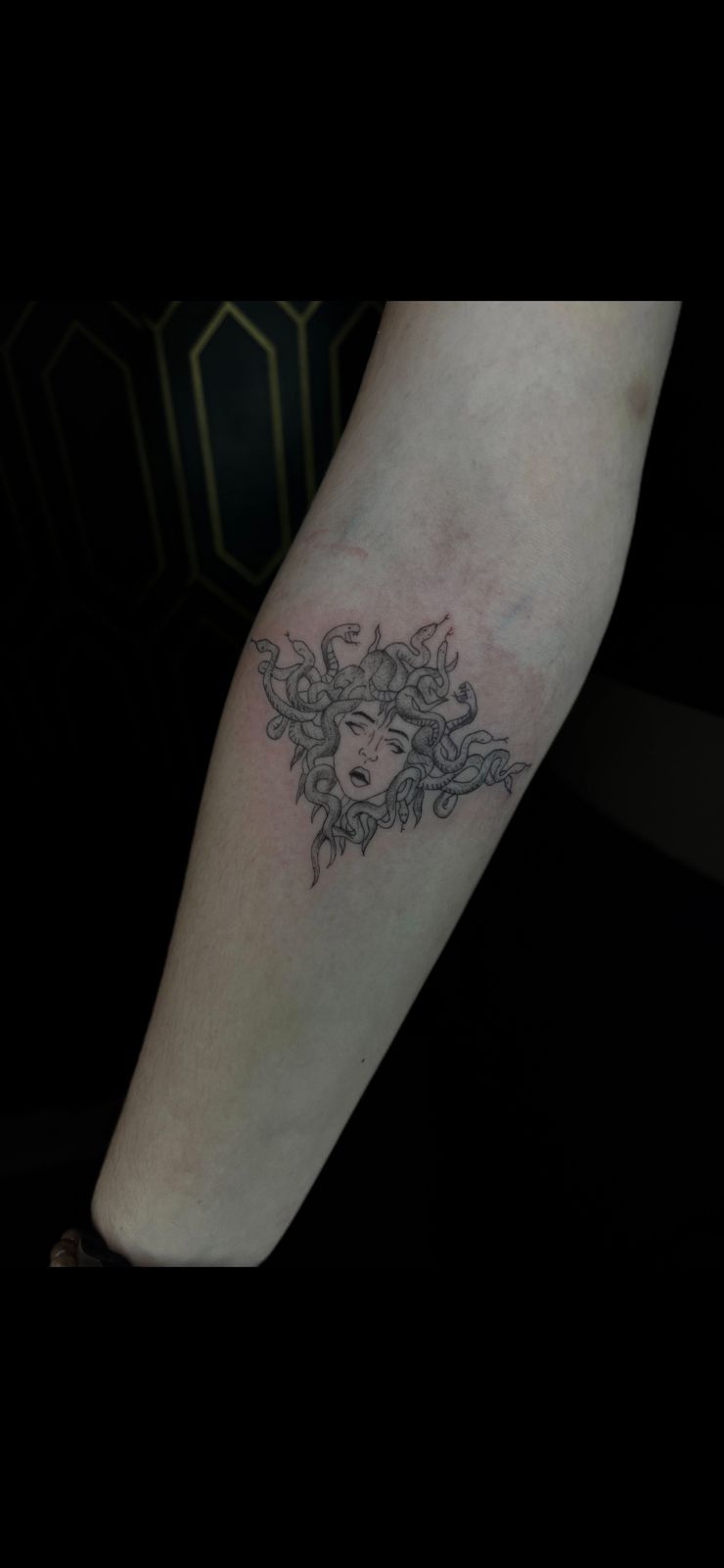 Paulina Ferreira fine line tattoo forearm