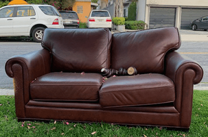 couch with used items on it