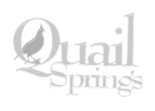 A black and white logo for quail springs with a bird on it.