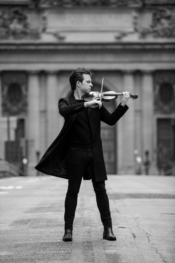 Gregory Harrington performing on violin in a publicity photo, international violinist and recording artist Gregory Harrington performing on violin in a publicity photo, international
violinist and recording artist
