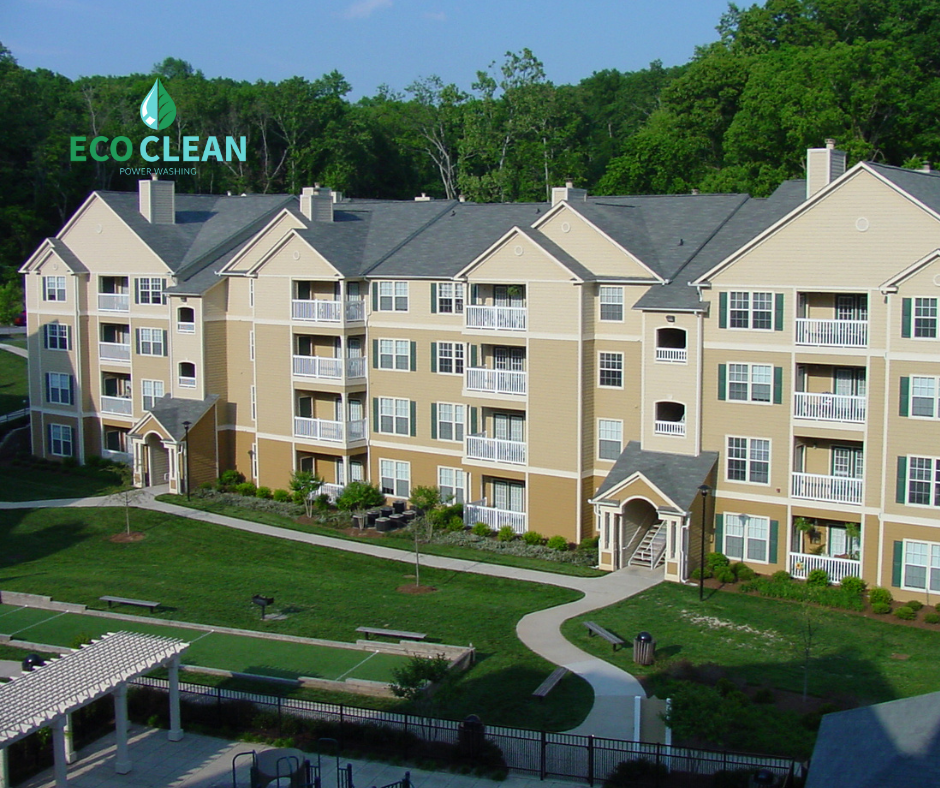 A large apartment building with a sign that says eco clean