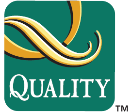 A quality hotel logo with a green background
