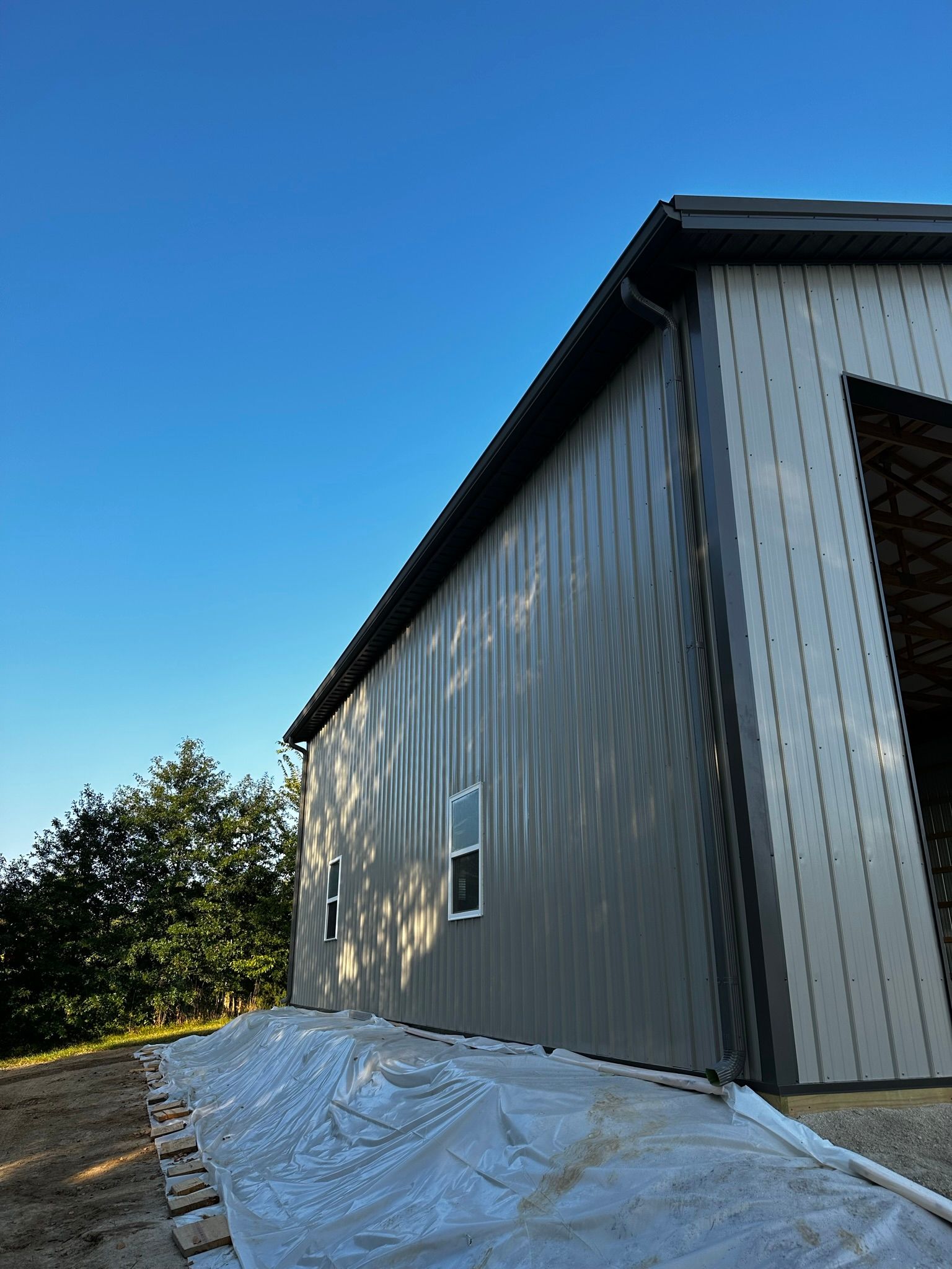 a large building with a blue sky in the background