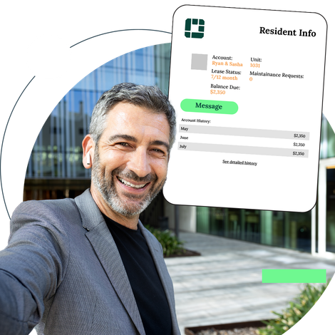 Man taking a selfie with a digital screen showing resident info against a modern building.
