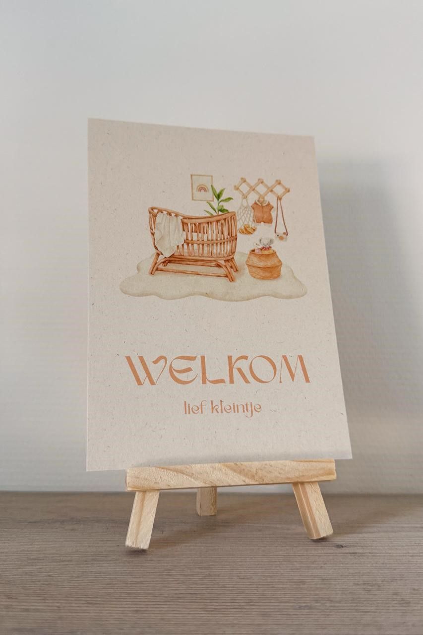 Sign with watercolor illustration on easel; 