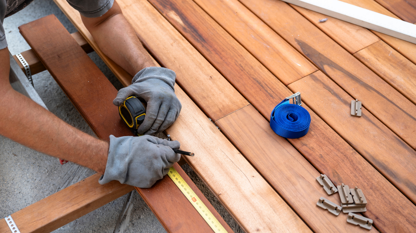 Before-and-after deck board replacement and resealing.
