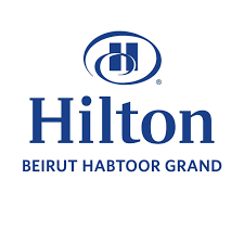 A blue logo for hilton beirut habtoor grand