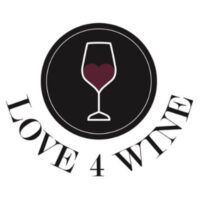Logo: Black circle with a wine glass containing a heart-shaped wine.
