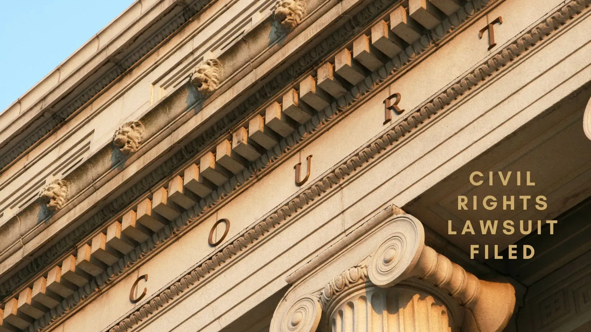 A low-angle view of a classical courthouse facade with 