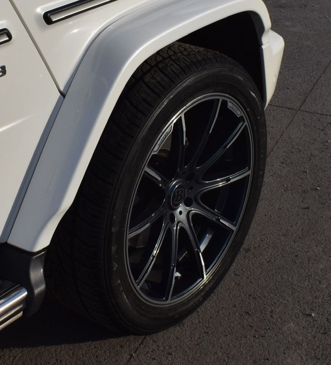 A white jeep with the number 9 on the side