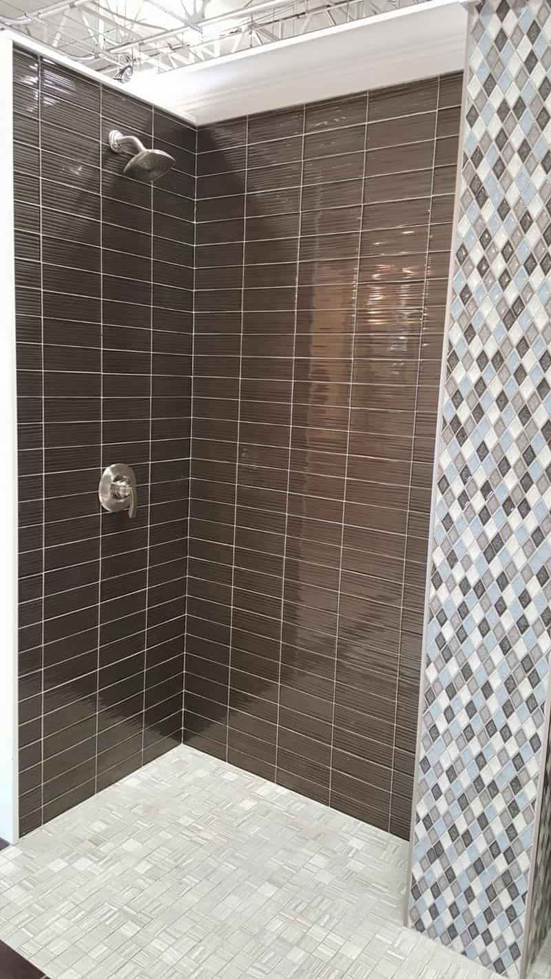 brown bricked walk in shower
