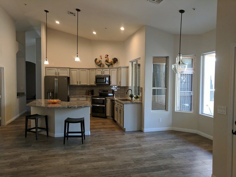 open kitchen with angular island in middle