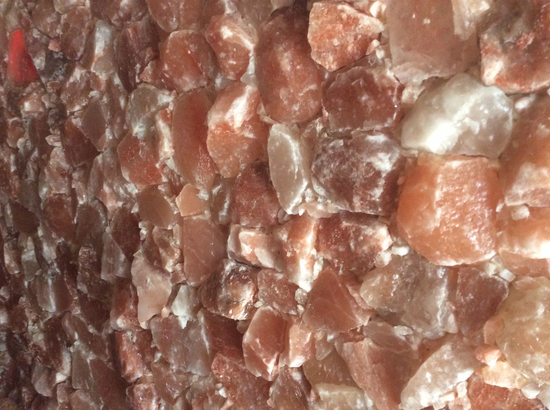A close up of a pile of rocks on a wall