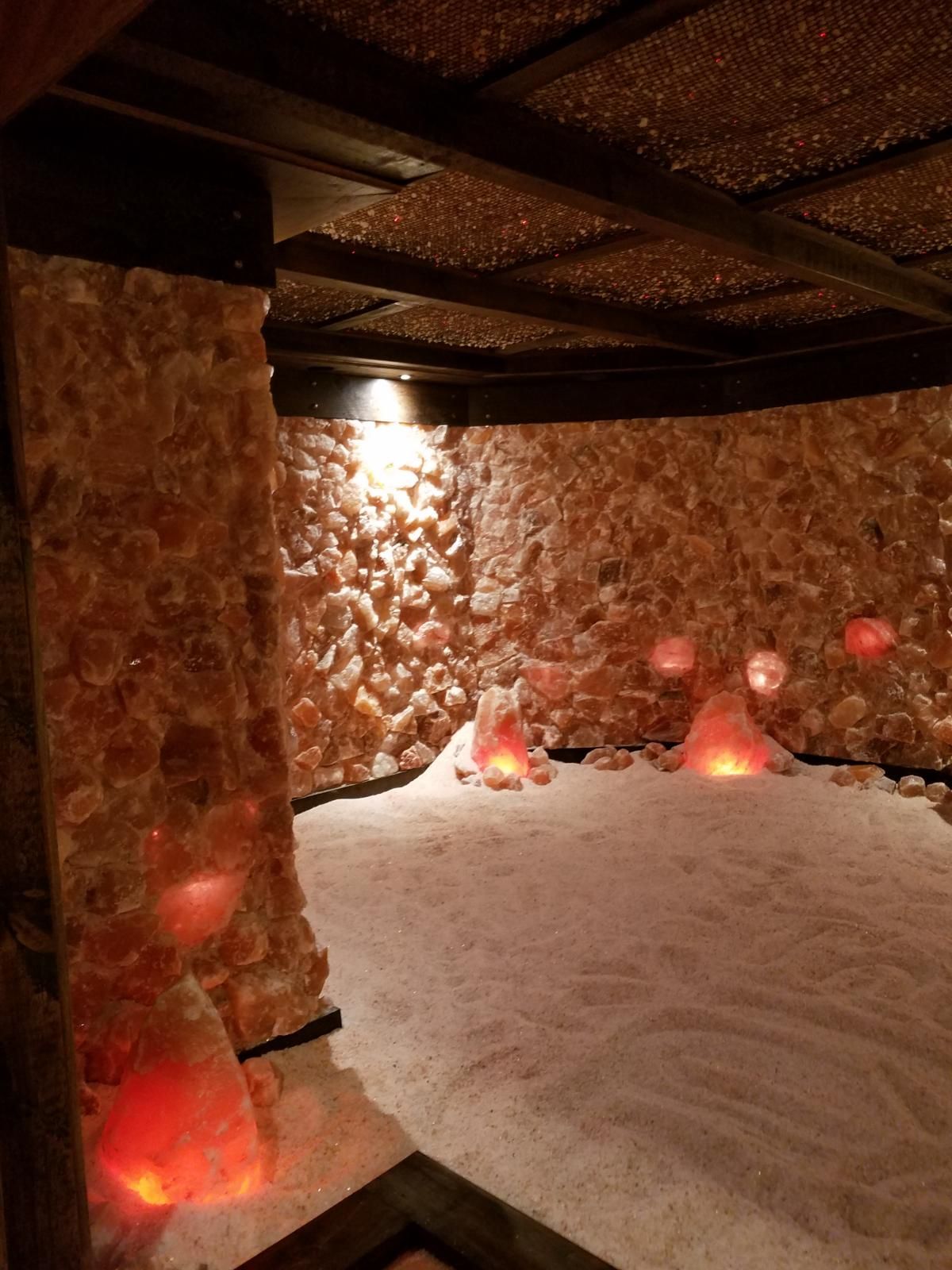 Salt cave with a lot of rocks and candles in it